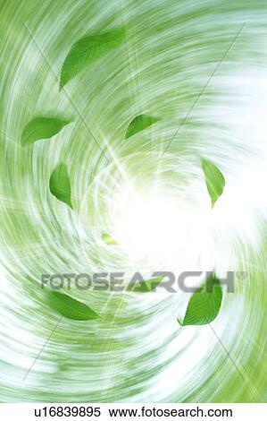 Stock Photography - Leaves swirling in the air. Fotosearch