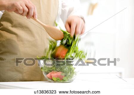 Man making salad View Large Photo Image Stock Image - Man making salad. Fotosearch