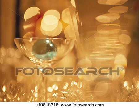Martini glass on table View Large Photo Image Stock Photo - Martini glass on table. Fotosearch