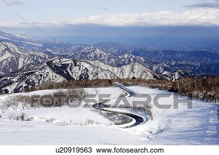 Mountain range and a winding road, Kirifuri Kogen, Nikko, Tochigi Prefecture, Japan View Large Photo Image Stock Image - Mountain range and a winding road, Kirifuri Kogen, Nikko, Tochigi Prefecture, Japan. Fotosearch