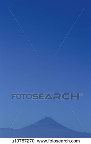 Mt. Fuji against blue sky. Mt Yatsugatake, Yamanashi Prefecture, Japan View Large Photo Image Stock Image - Mt. Fuji against blue sky. Mt Yatsugatake, Yamanashi Prefecture, Japan. Fotosearch