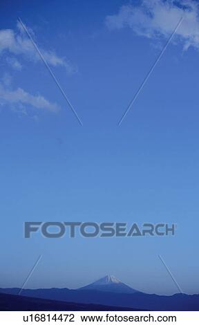 Stock Image - Mt. Fuji against blue sky. Mt Yatsugatake, Yamanashi Prefecture, Japan. Fotosearch
