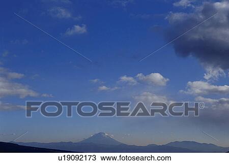 Stock Image - Mt. Fuji against blue sky. Mt Yatsugatake, Yamanashi Prefecture, Japan. Fotosearch