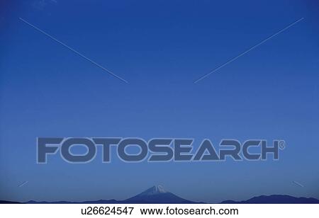 Stock Photo - Mt. Fuji against blue sky. Mt Yatsugatake, Yamanashi Prefecture, Japan. Fotosearch