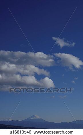 Stock Photograph - Mt. Fuji against blue sky. Mt Yatsugatake, Yamanashi Prefecture, Japan. Fotosearch