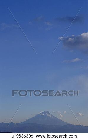 Stock Photography - Mt. Fuji against blue sky. Mt Yatsugatake, Yamanashi Prefecture, Japan. Fotosearch