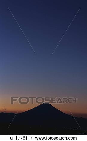 Mt Fuji at sunset in distance. Mt Yatsugatake, Yamanashi Prefecture, Japan View Large Photo Image Stock Photo - Mt Fuji at sunset in distance. Mt Yatsugatake, Yamanashi Prefecture, Japan. Fotosearch
