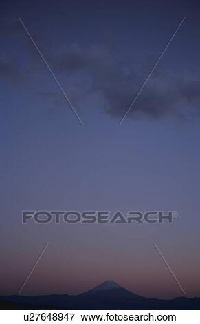 Mt Fuji at sunset in distance. Mt Yatsugatake, Yamanashi Prefecture, Japan View Large Photo Image Stock Photo - Mt Fuji at sunset in distance. Mt Yatsugatake, Yamanashi Prefecture, Japan. Fotosearch