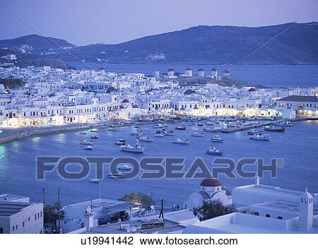 Stock Image - Mykonos harbor at dusk, Mykonos, Greece. Fotosearch
