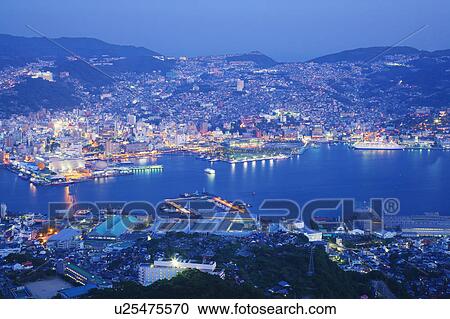 Stock Image - Nagasak cityscape at dusk, Japan. Fotosearch