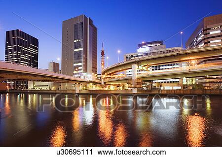 Stock Image - Nakanoshima at night, Kita Ward, Osaka, Japan. Fotosearch