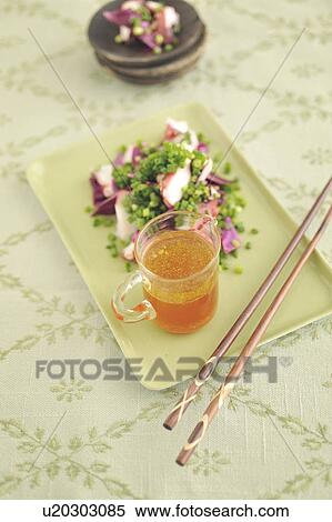 Stock Photography - Octopus salad and salad dressing. Fotosearch