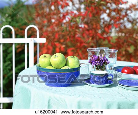 Outdoor table set with fresh apples View Large Photo Image Stock Image - Outdoor table set with fresh apples. Fotosearch
