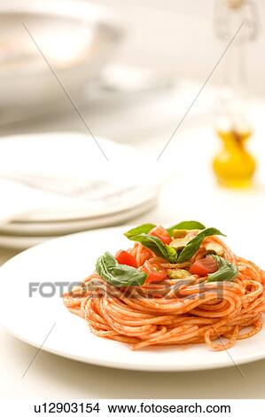 Pasta dish with basil View Large Photo Image Picture - Pasta dish with basil. Fotosearch