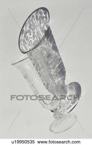 Patterned glass with shadow on white background View Large Photo Image Stock Photography - Patterned glass with shadow on white background. Fotosearch