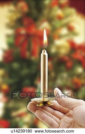 Person holding a candle View Large Photo Image Stock Image - Person holding a candle. Fotosearch