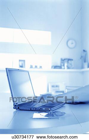 Stock Photo - Person typing on laptop. Fotosearch