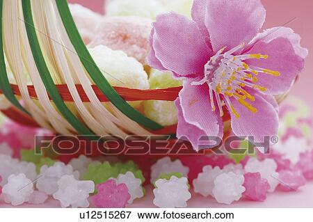 Pink flower and Japanese kompeito candy View Large Photo Image Stock Photo - Pink flower and Japanese kompeito candy. Fotosearch