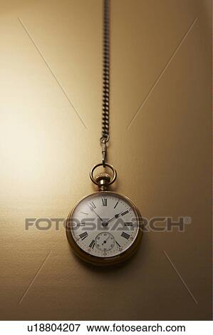 Stock Photo - Pocket watch with chain. Fotosearch
