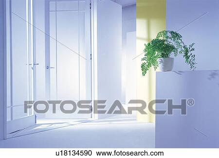 Potted plant on a shelf by a door View Large Photo Image Stock Image - Potted plant on a shelf by a door. Fotosearch