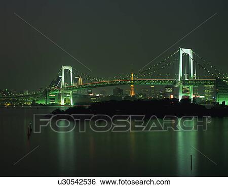Stock Photograph - Rainbow Bridge at night, Tokyo, Japan. Fotosearch