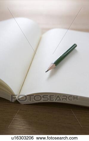 Recycled paper notebook and a pencil View Large Photo Image Stock Photograph - Recycled paper notebook and a pencil. Fotosearch