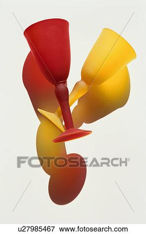 Red and yellow wineglasses on white background View Large Photo Image Stock Photo - Red and yellow wineglasses on white background. Fotosearch