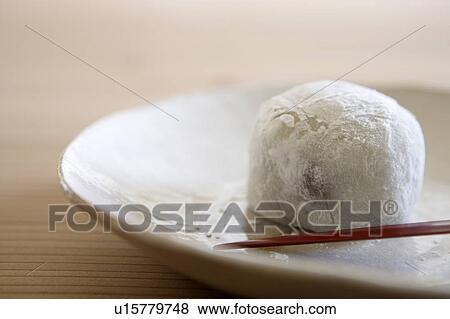 Stock Photo - Rice cake on a plate. Fotosearch