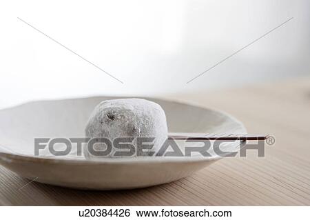 Stock Photograph - Rice cake on a plate. Fotosearch