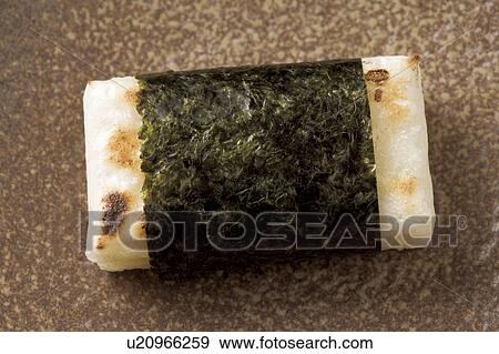 Stock Photo - Rice cake with seaweed wrap. Fotosearch