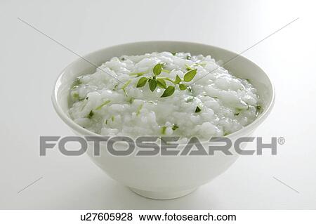 Rice gruel seasoned with herbs View Large Photo Image Stock Photo - Rice gruel seasoned with herbs. Fotosearch