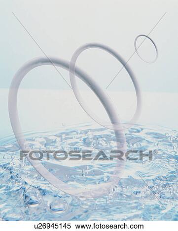 Rings and water View Large Photo Image Stock Photography - Rings and water. Fotosearch
