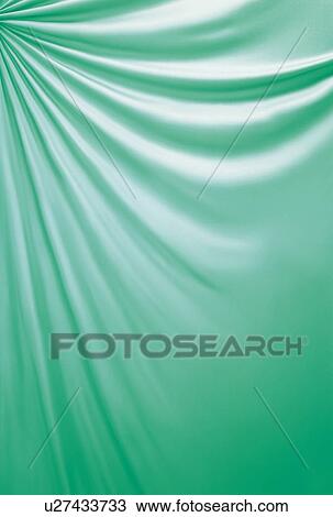 Stock Image - Rippled green cloth. Fotosearch