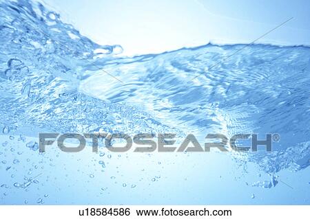 Stock Photograph - Rippled water surface, close up, blue background. Fotosearch