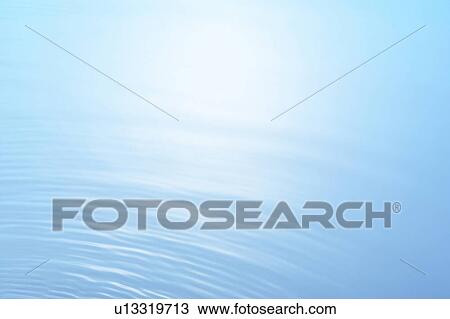 Stock Image - Rippled water surface, close up, full frame, copy space. Fotosearch