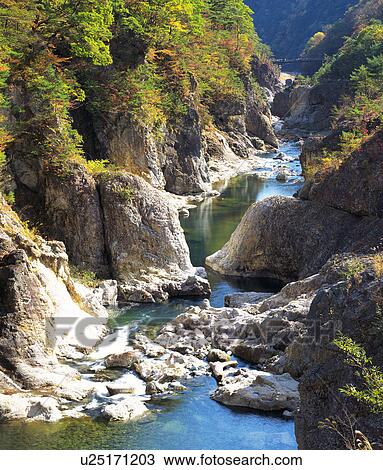 Stock Image - River winding through canyon, Nikko, Tochigi Prefecture, Japan. Fotosearch