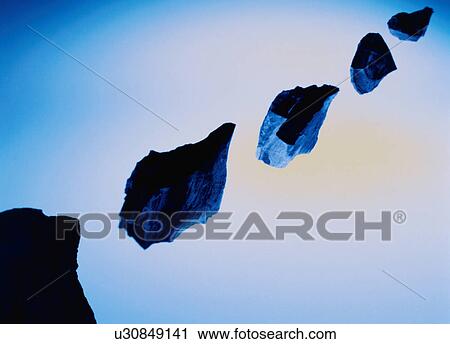 Rocks in mid-air View Large Photo Image Stock Image - Rocks in mid-air. Fotosearch