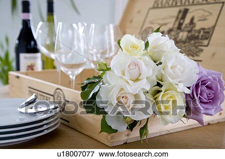 Stock Photo - Roses and wineglasses. Fotosearch