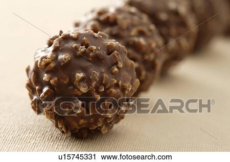 Rough round chocolates View Large Photo Image Stock Image - Rough round chocolates. Fotosearch