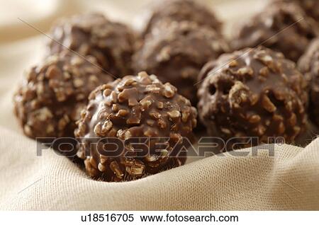 Stock Photography - Rough round chocolates. Fotosearch