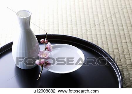 Sake and plum blossoms View Large Photo Image Stock Image - Sake and plum blossoms. Fotosearch
