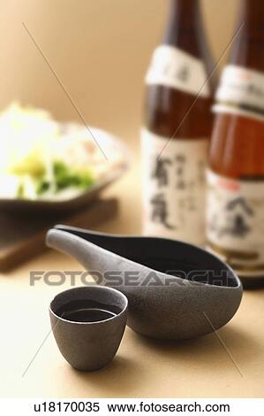 Stock Photography - Sake bottles, decanter and cup. Fotosearch