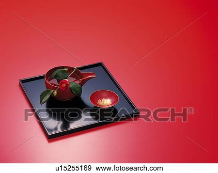 Stock Photo - Saki cup on tray. Fotosearch