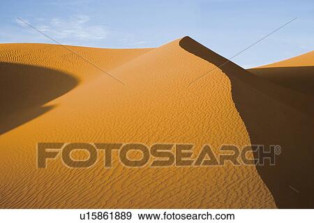 Stock Photo - Sand dunes in desert, Libya, North Africa. Fotosearch