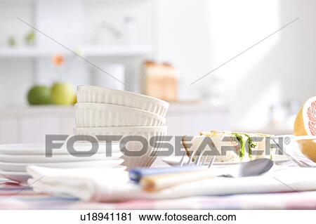 Stock Image - Sandwiches and fruit on a table. Fotosearch
