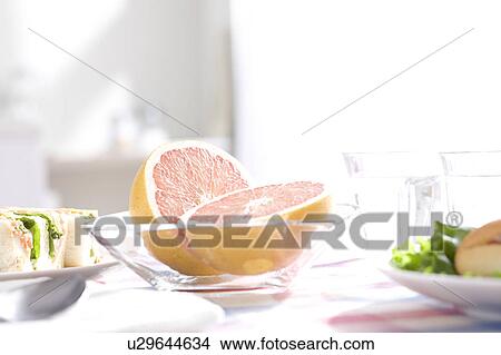Picture - Sandwiches and grapefruit. Fotosearch