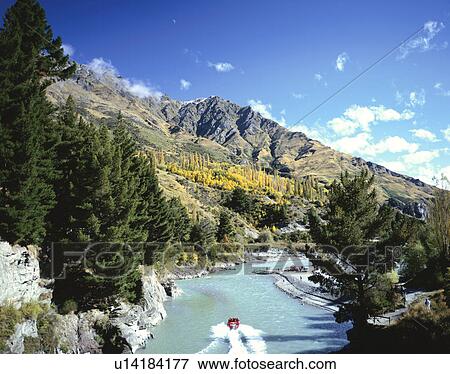 Stock Photo - Shotover Jet in river. Queenstown, New Zealand. Fotosearch