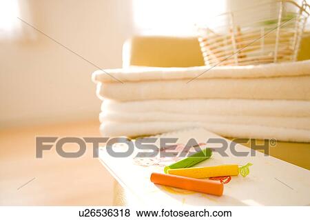 Sketch pad on a sofa View Large Photo Image Stock Photo - Sketch pad on a sofa. Fotosearch