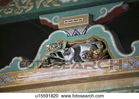 Stock Image - Sleeping cat carving, Toshogu Shrine, Nikko, Tochigi Prefecture, Japan. Fotosearch