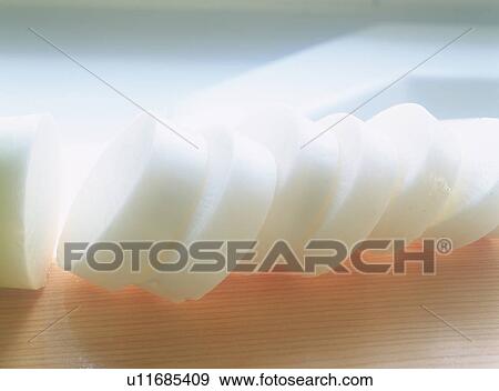 Stock Photo - Sliced Japanese radish. Fotosearch